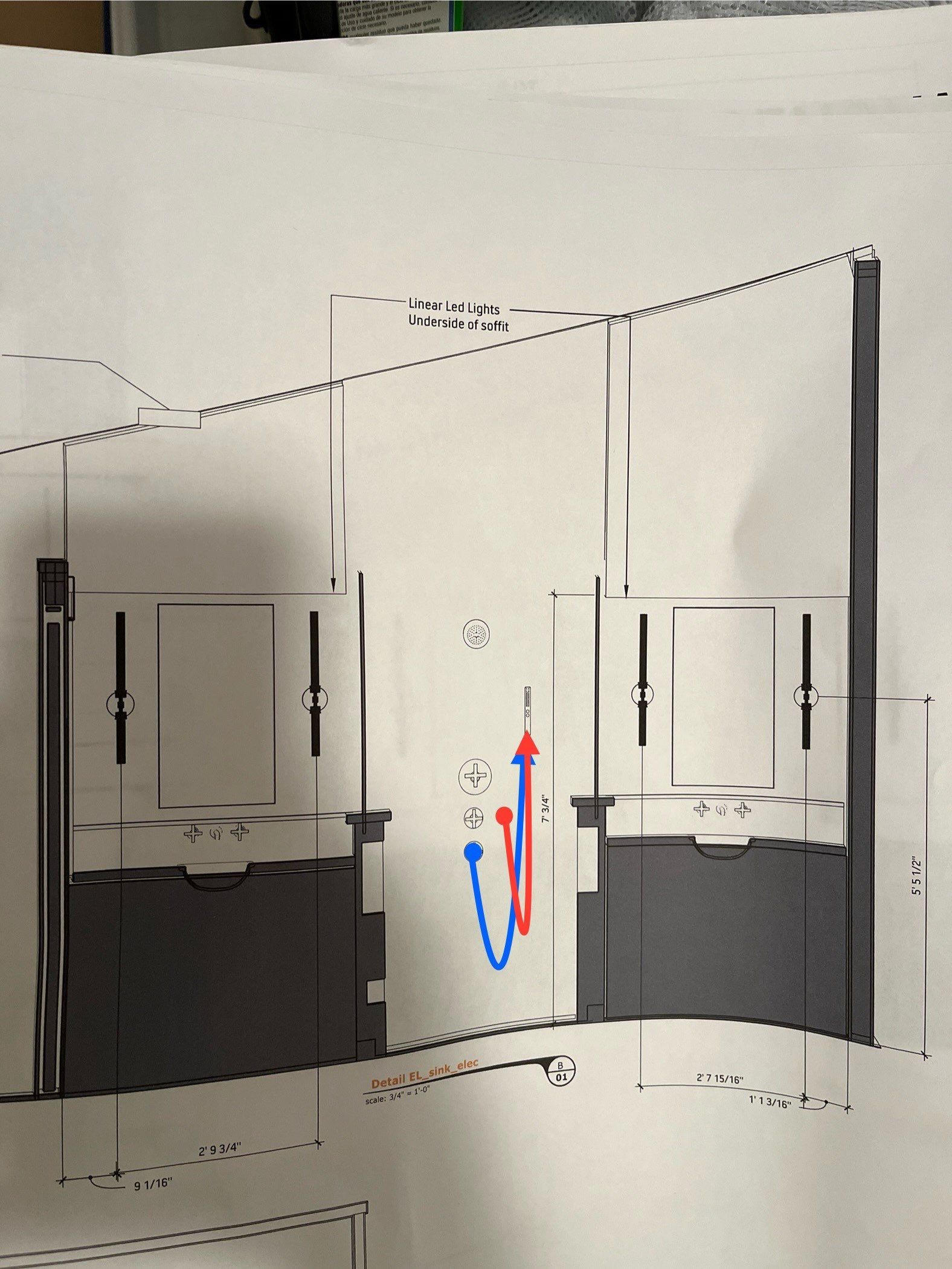 Faint blueprint-style sketch of a doorway or corridor with blue and red marks in the center