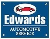 Edwards Automotive Service sign with red car logo on blue background