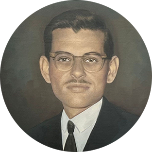 Formal portrait of a man in glasses, suit, and tie against a dark circular background