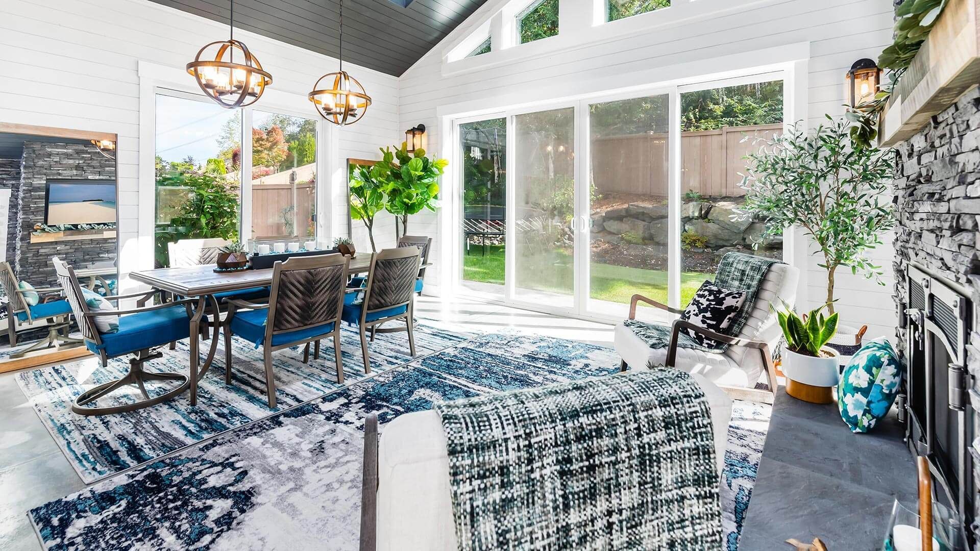 A living room filled with furniture and a fireplace.