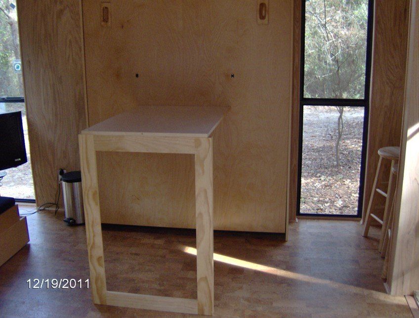 For small cabins, a frame that unfolds as a table