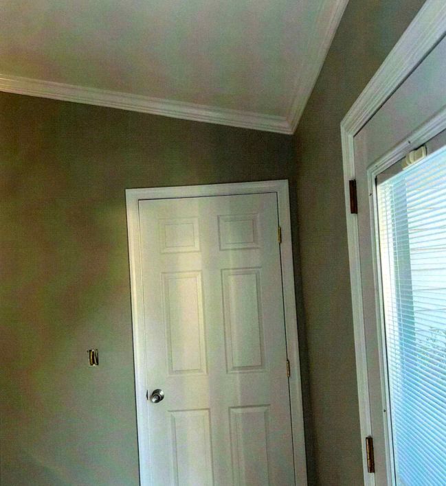 A room with a white door