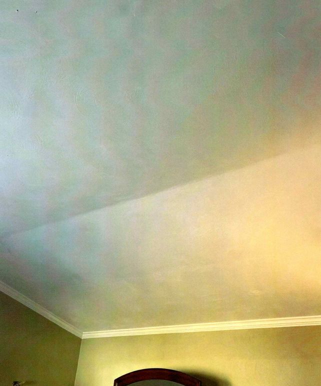 A room with a newly painted ceiling