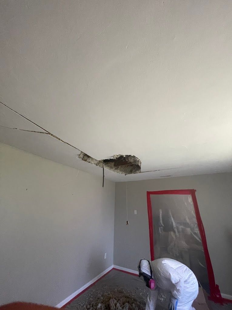 Room with cracked ceiling