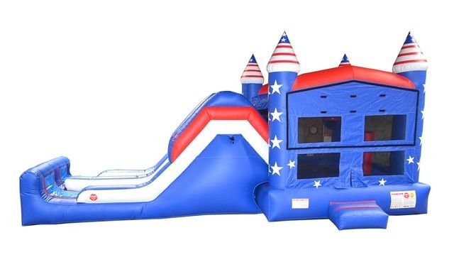 Blue, red, and white inflatable bounce house with slide, castle design.