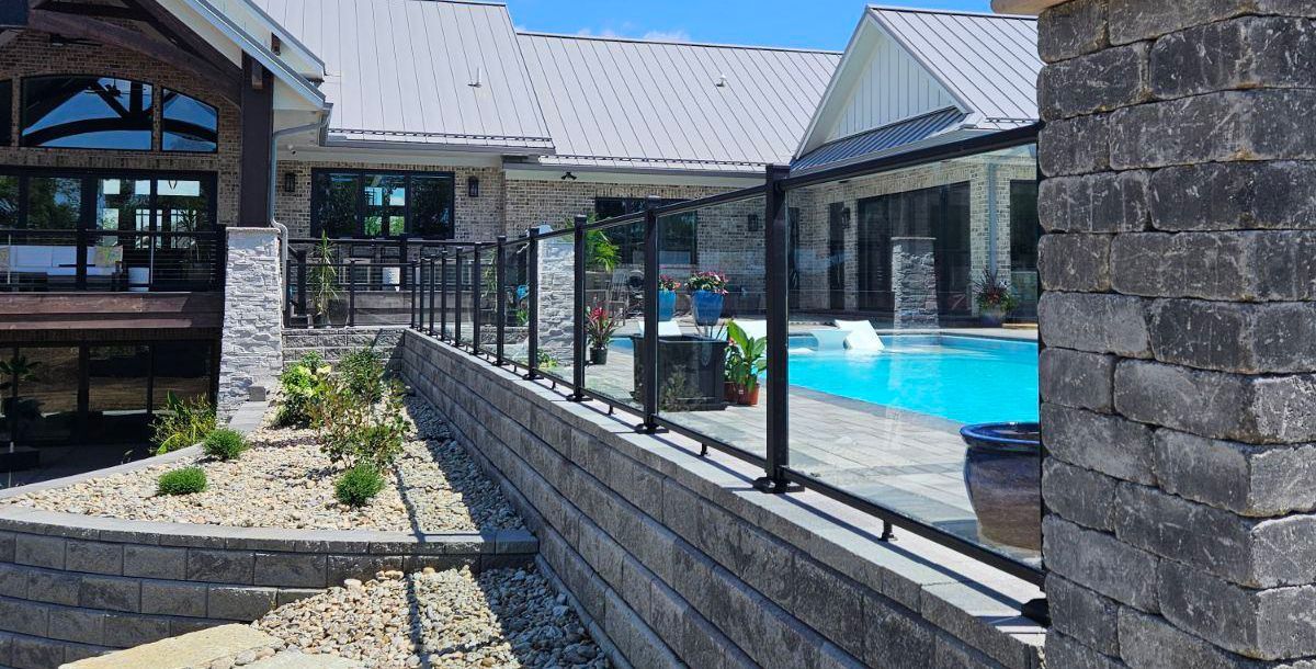 A bathroom with two sinks, a toilet, a tub, and a walk in shower.