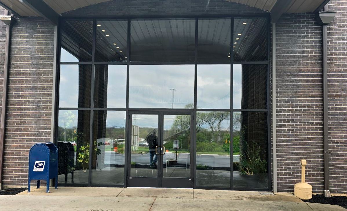 Commercial space with large glass mirror.