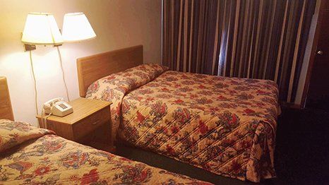 Learn More About Accommodations Motel room