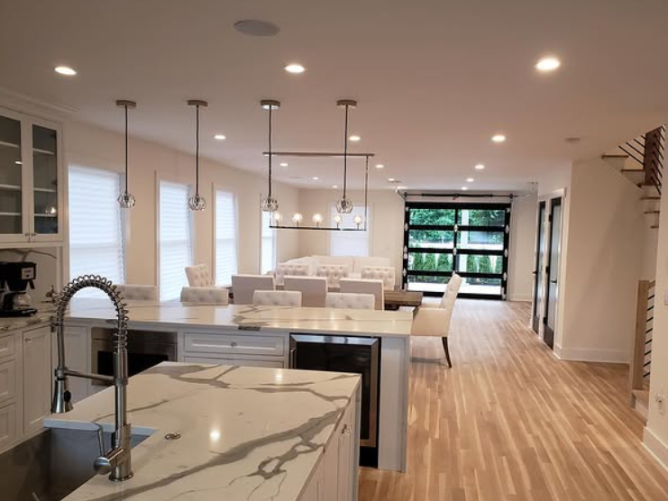 Modern kitchen and dining room with marble countertops