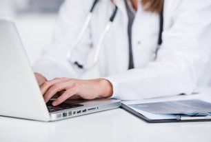 Medical staff using computer