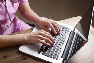 Medical staff using computer