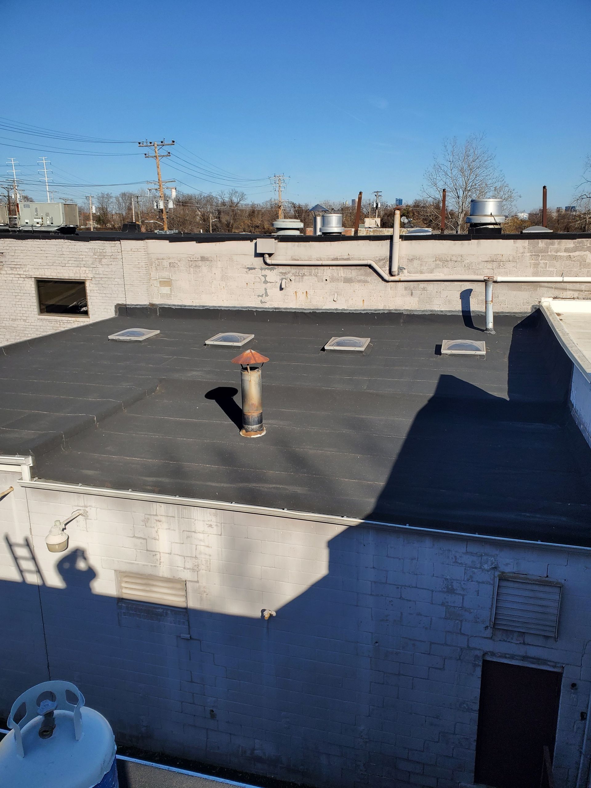 Baltimore City Commercial
New Ruberoid Roofing with 4 New Skylights