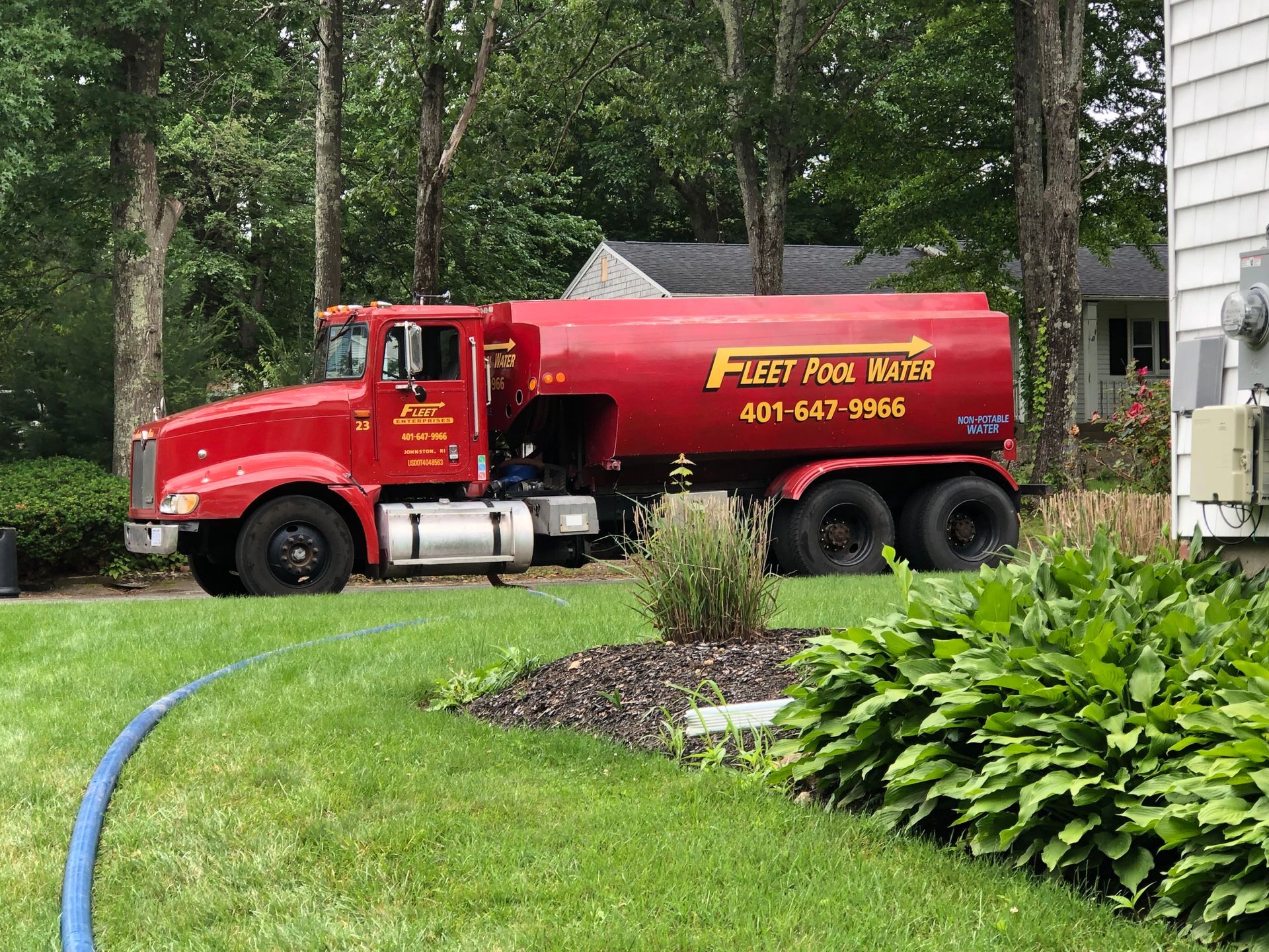 Fleet Water Delivery red truck parked
