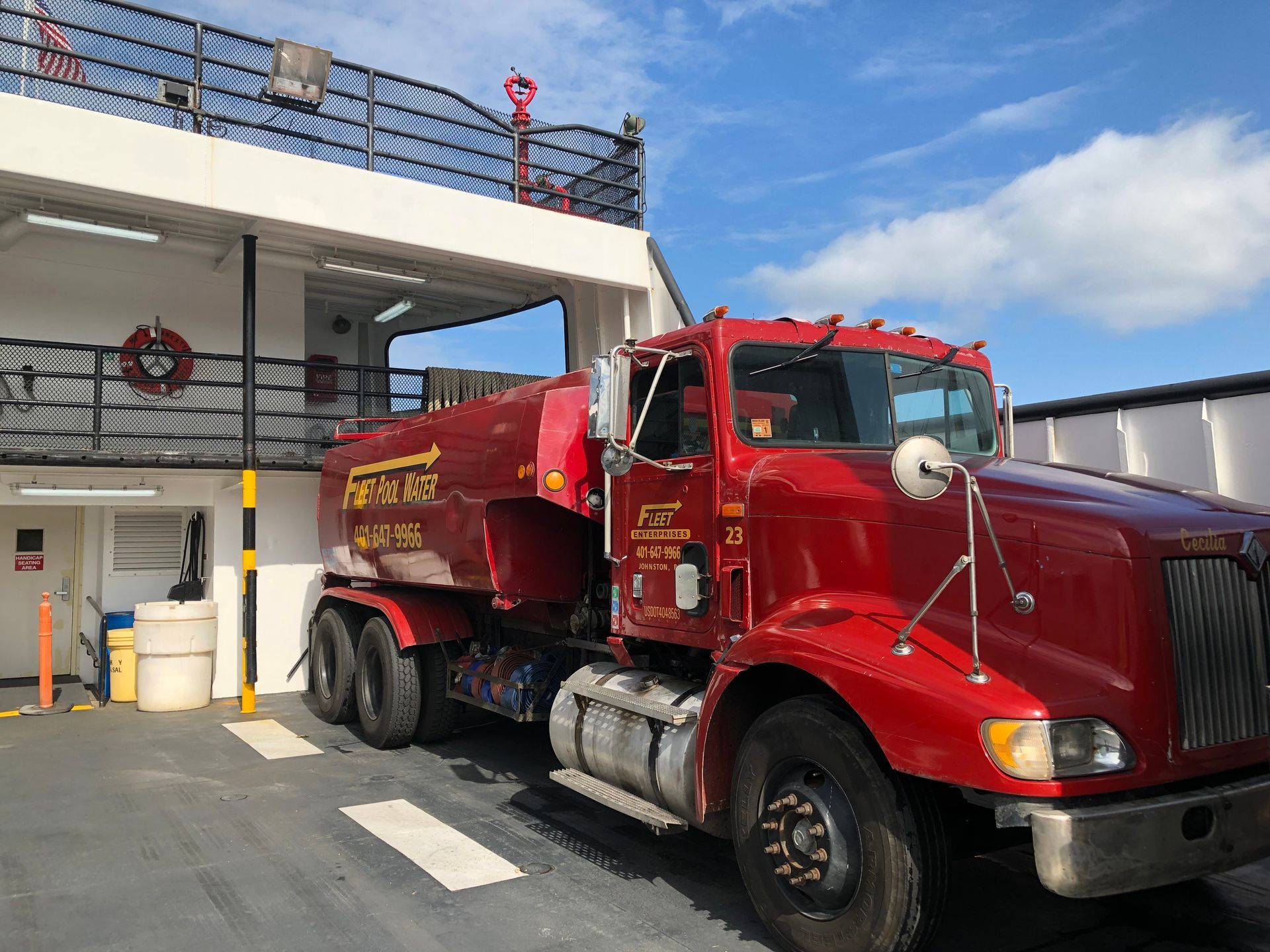 Fleet Water Delivery red truck right front body side view