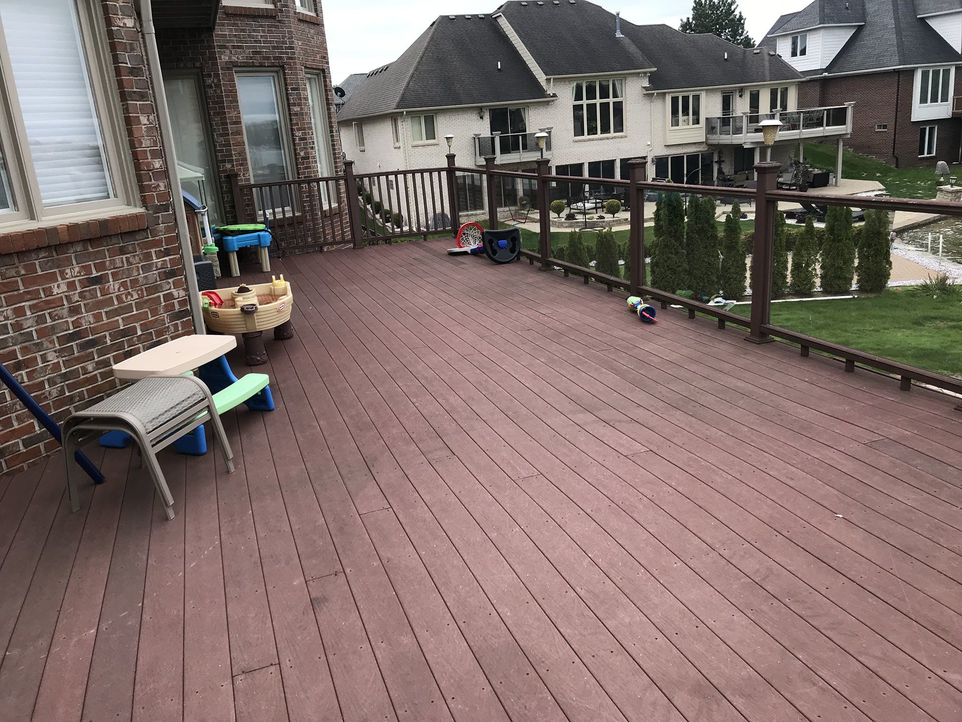 A large old brick house and deck