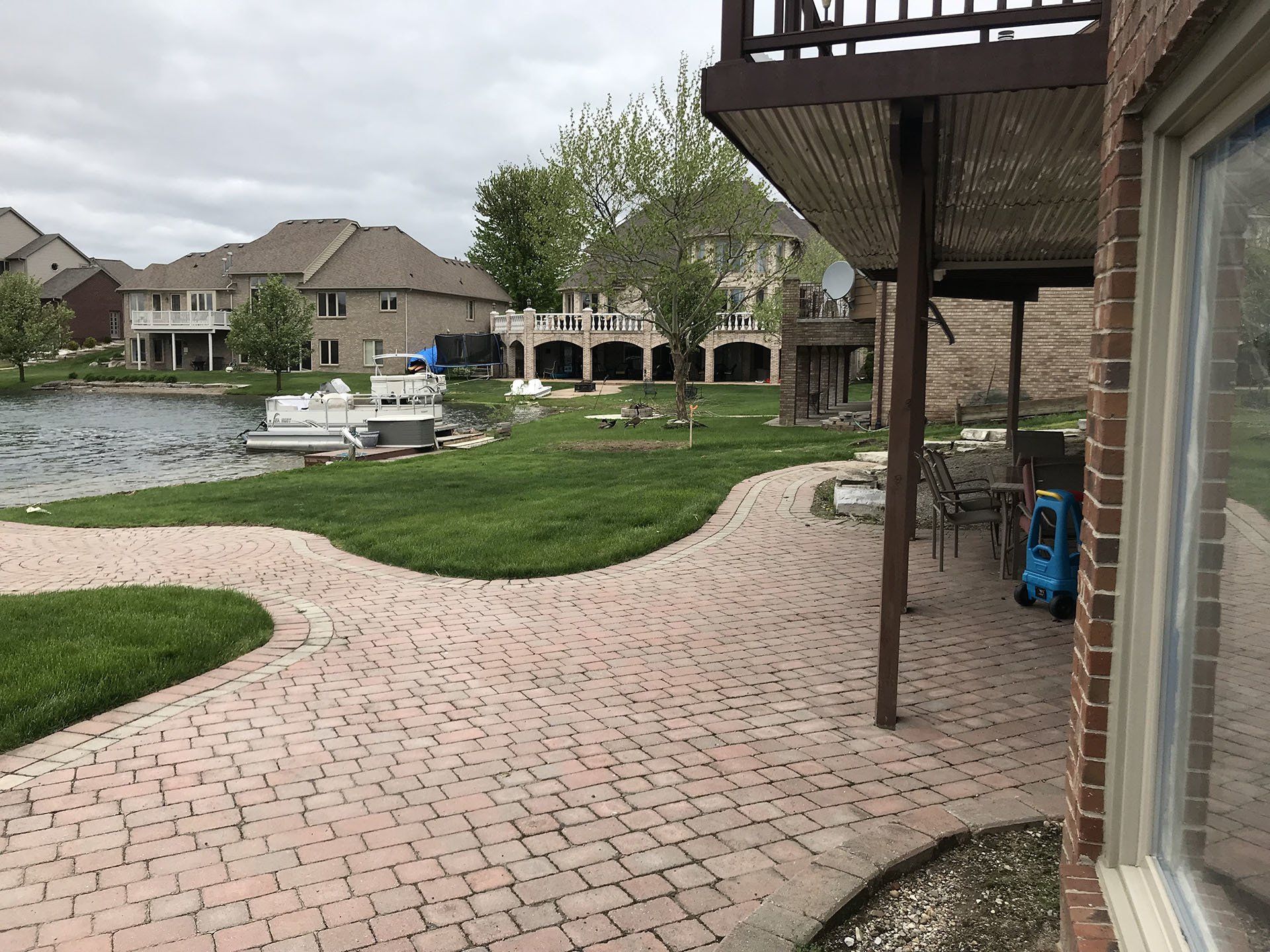 A large old brick house and driveway