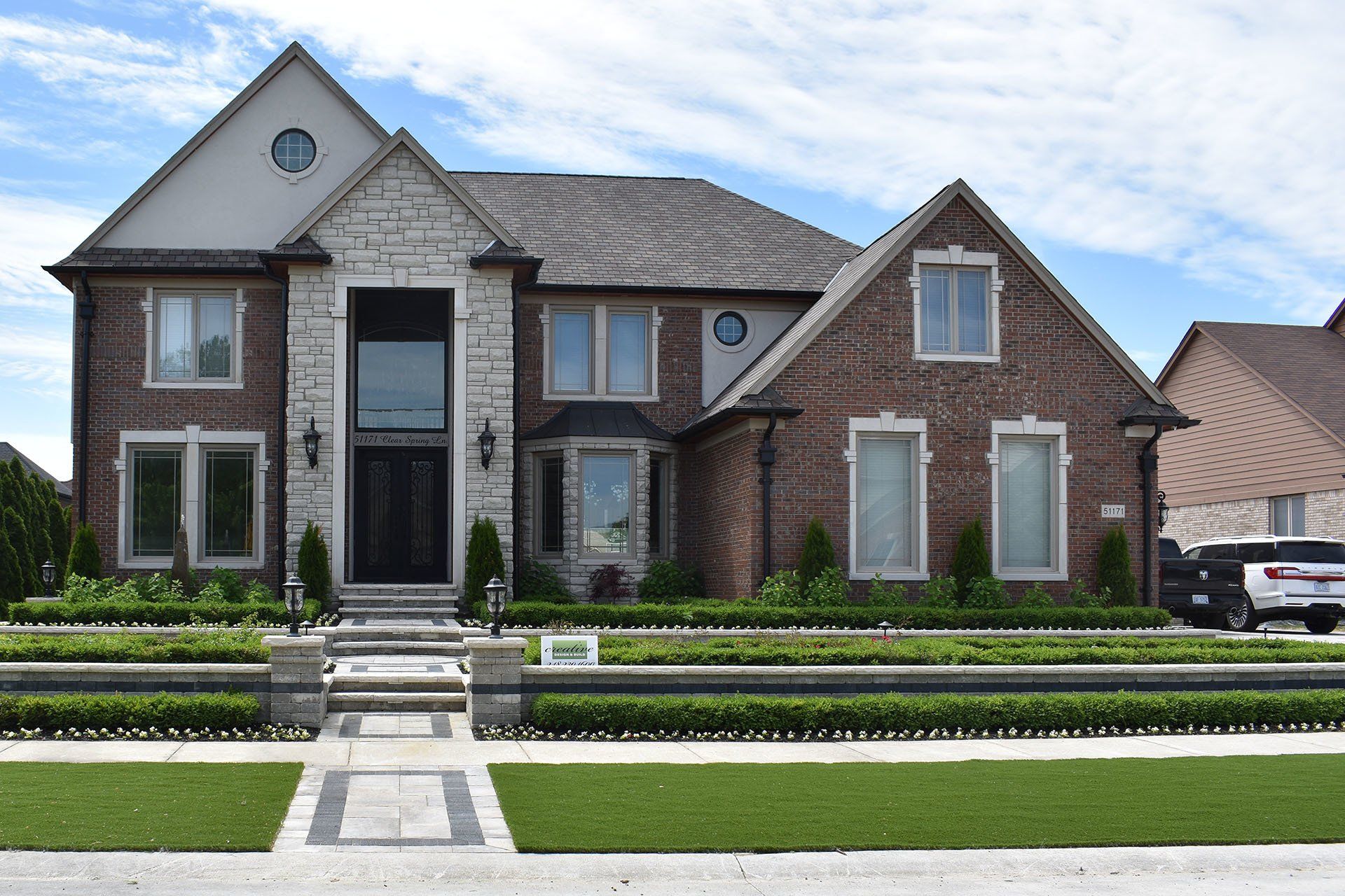 A large brick house with a lot of windows