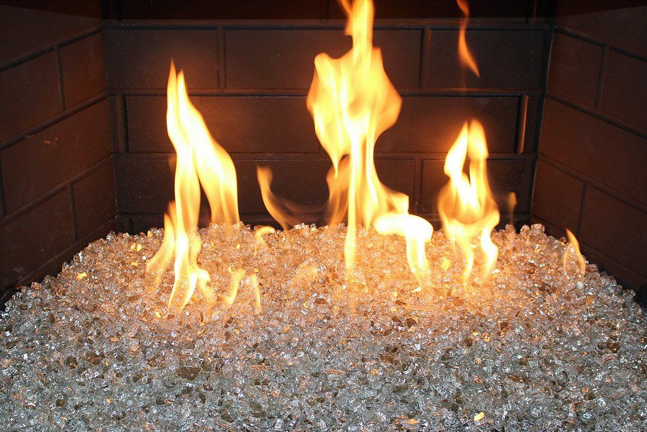 a fireplace with flames coming out of it