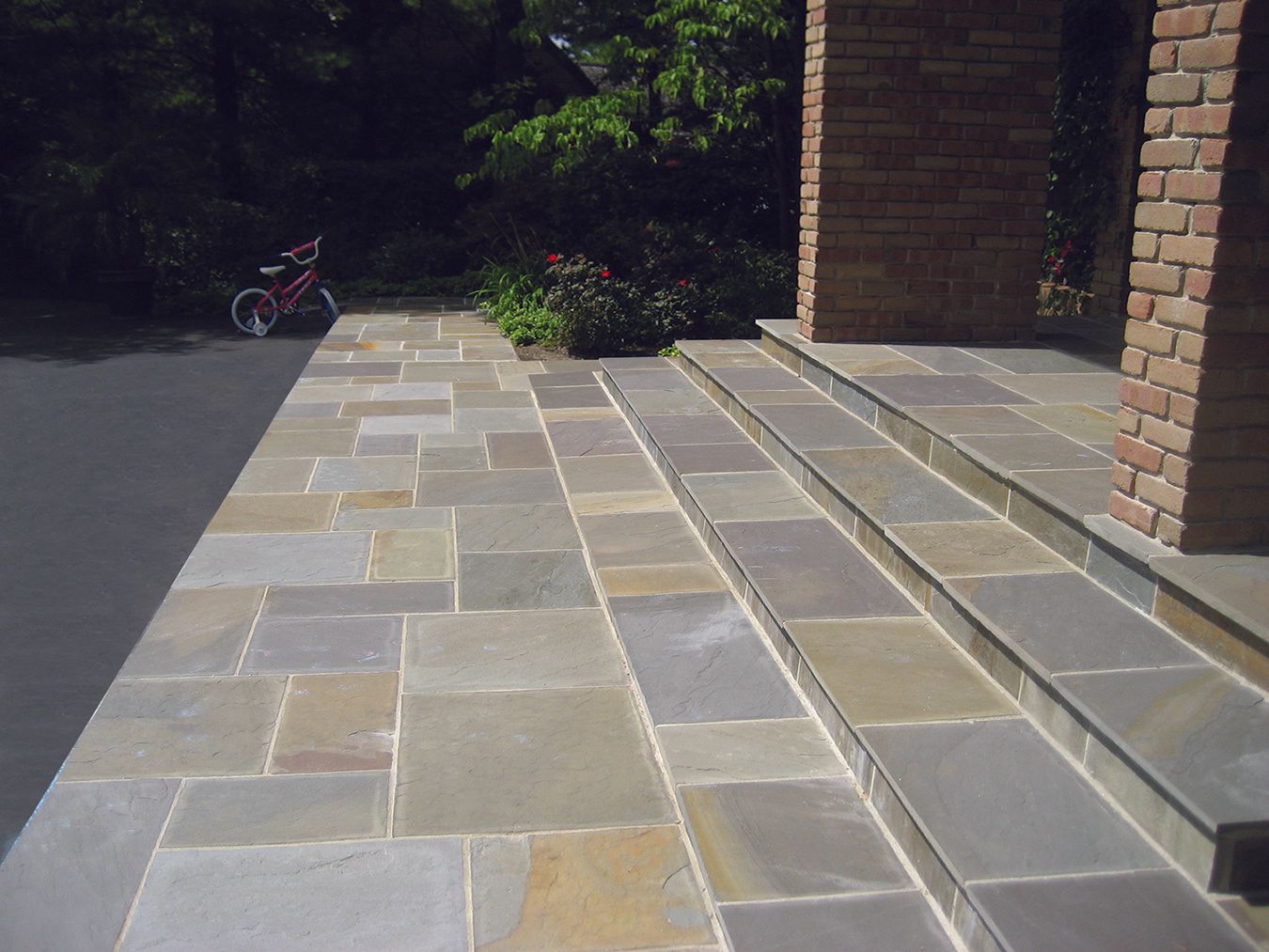 a brick building with steps leading up to it