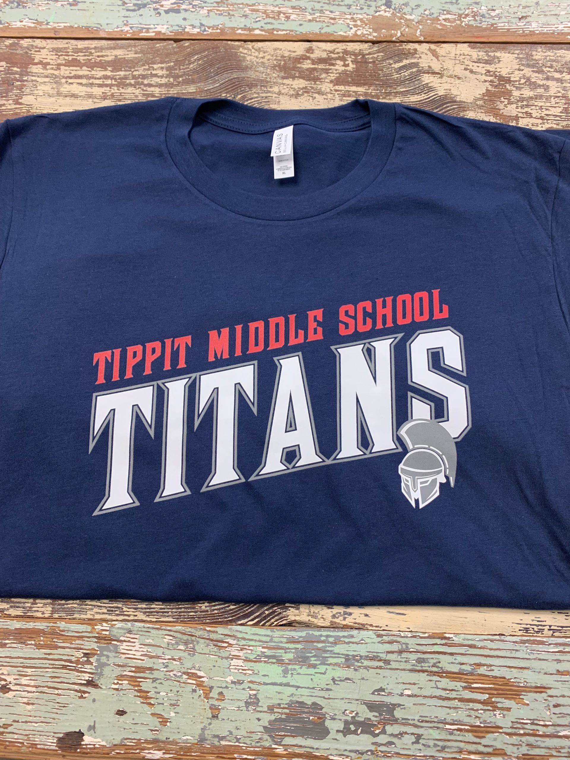 A blue t-shirt with the word titans on it.