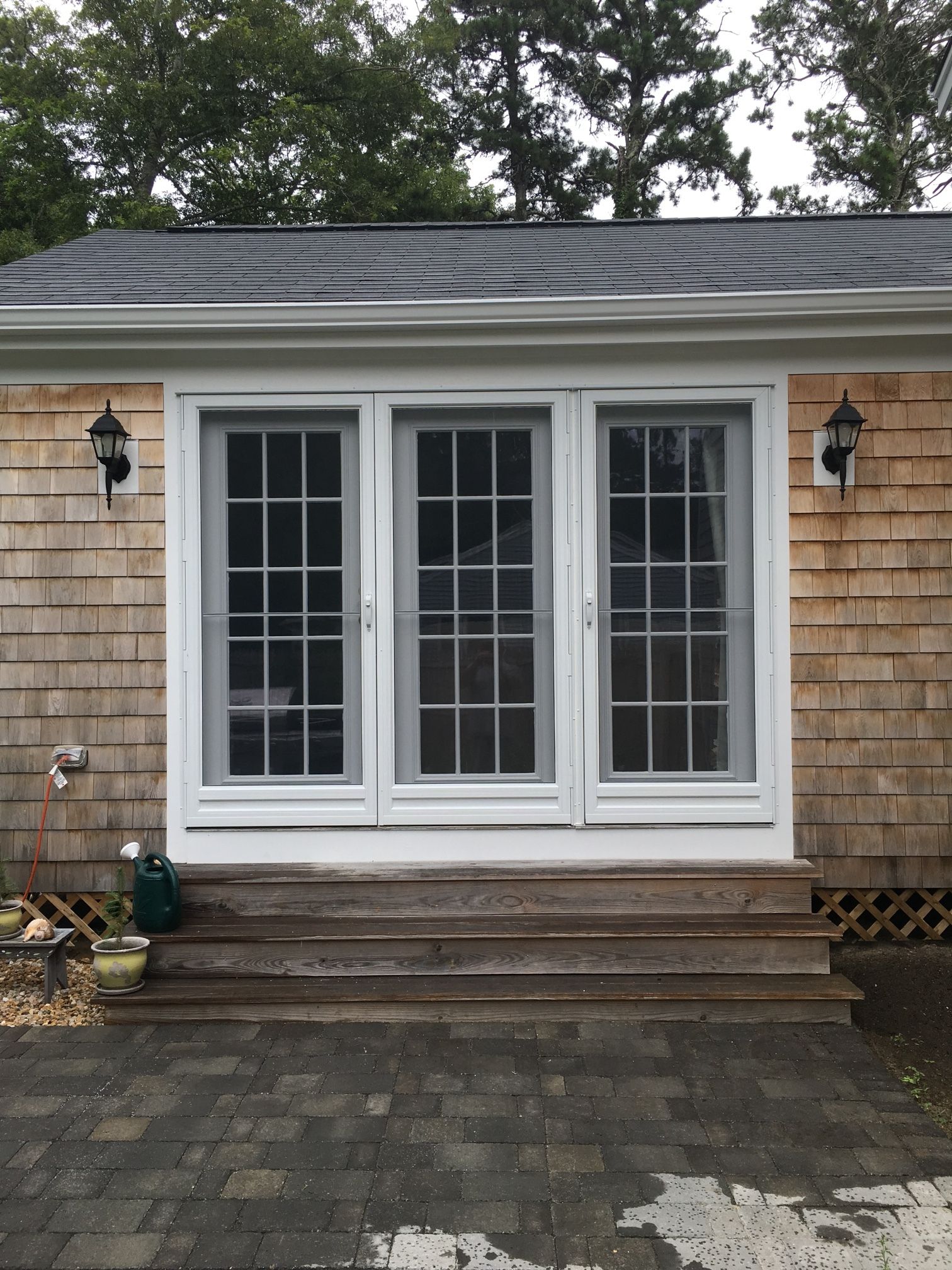 a house with a lot of windows and stairs