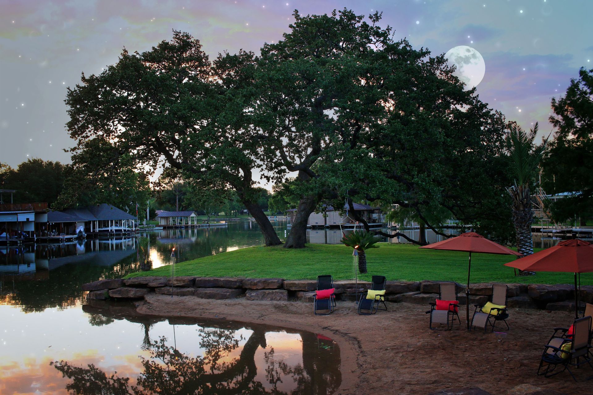 A full moon is visible in the sky over a lake