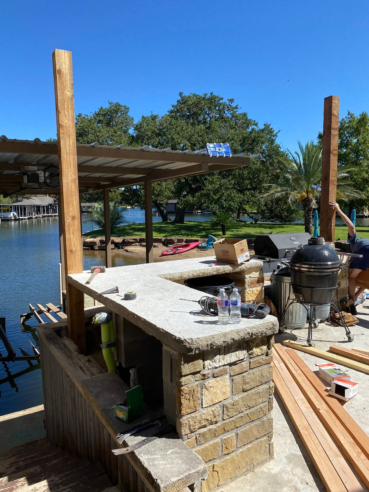 A bar is being built next to a body of water.