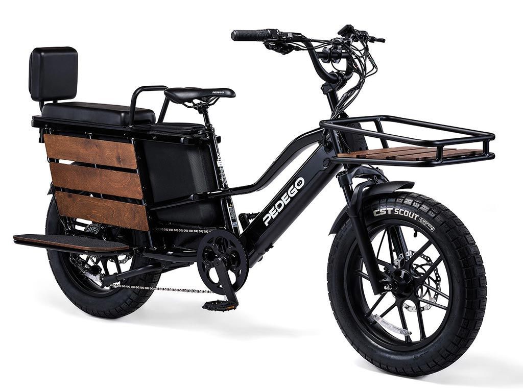 A black electric bicycle with a wooden basket on the front.