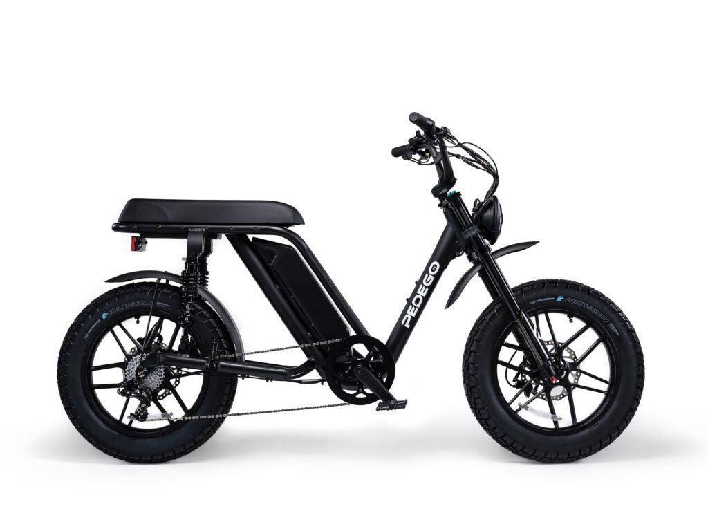 A black electric scooter on a white background.