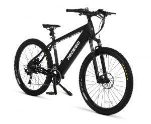 A black electric bike is sitting on a white surface.