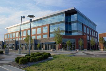 A large office building with a lot of windows