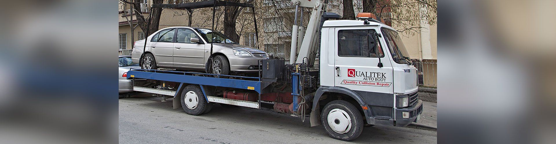 Qualitek Auto Body - Service Truck