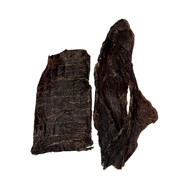 Two pieces of beef jerky on a white background