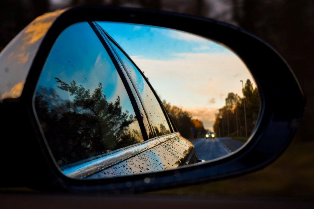 Car side view mirror with beautiful view on it