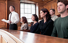Attorney with his clients in court room