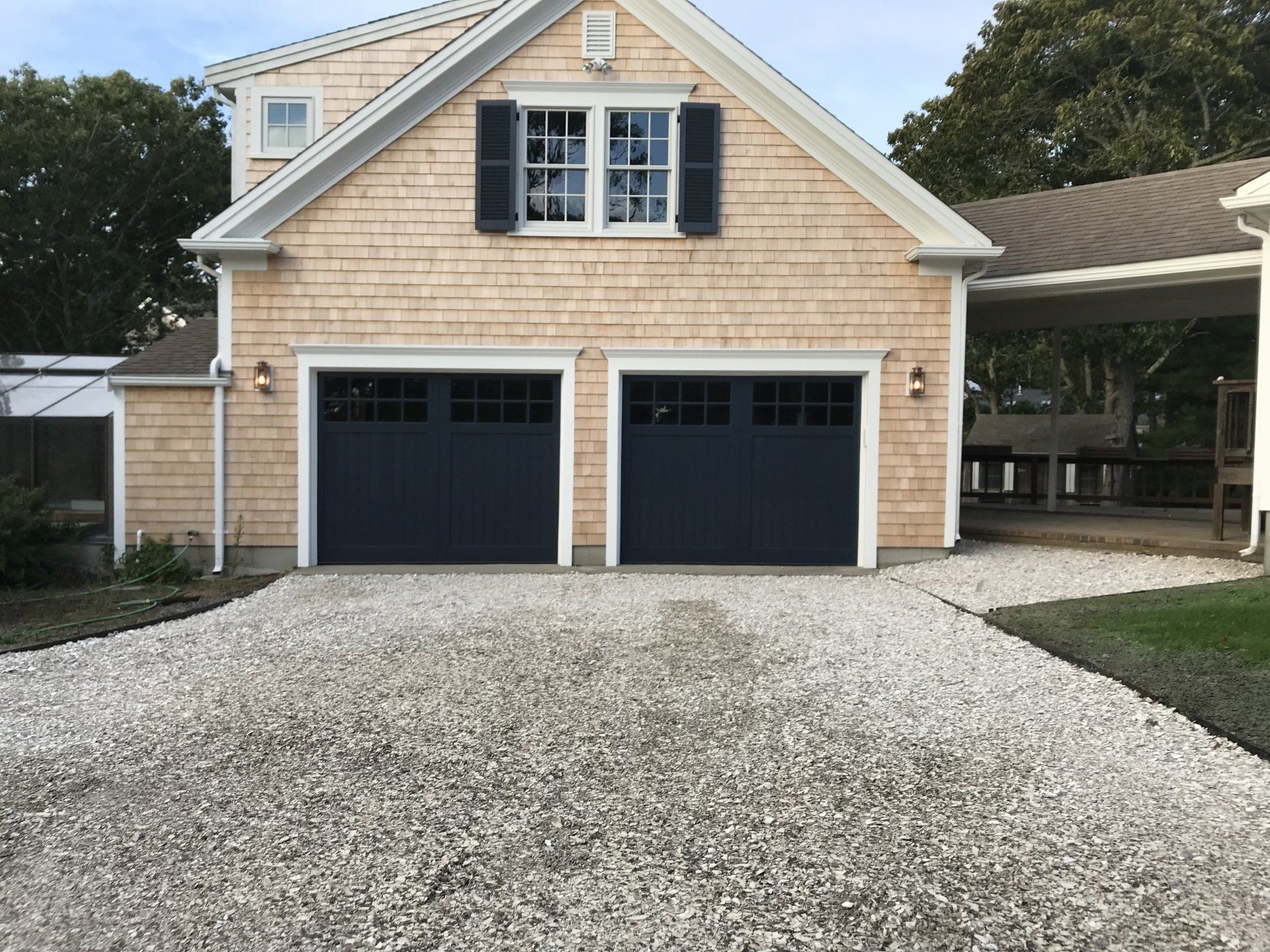 wood composite overlay blue double doors front view
