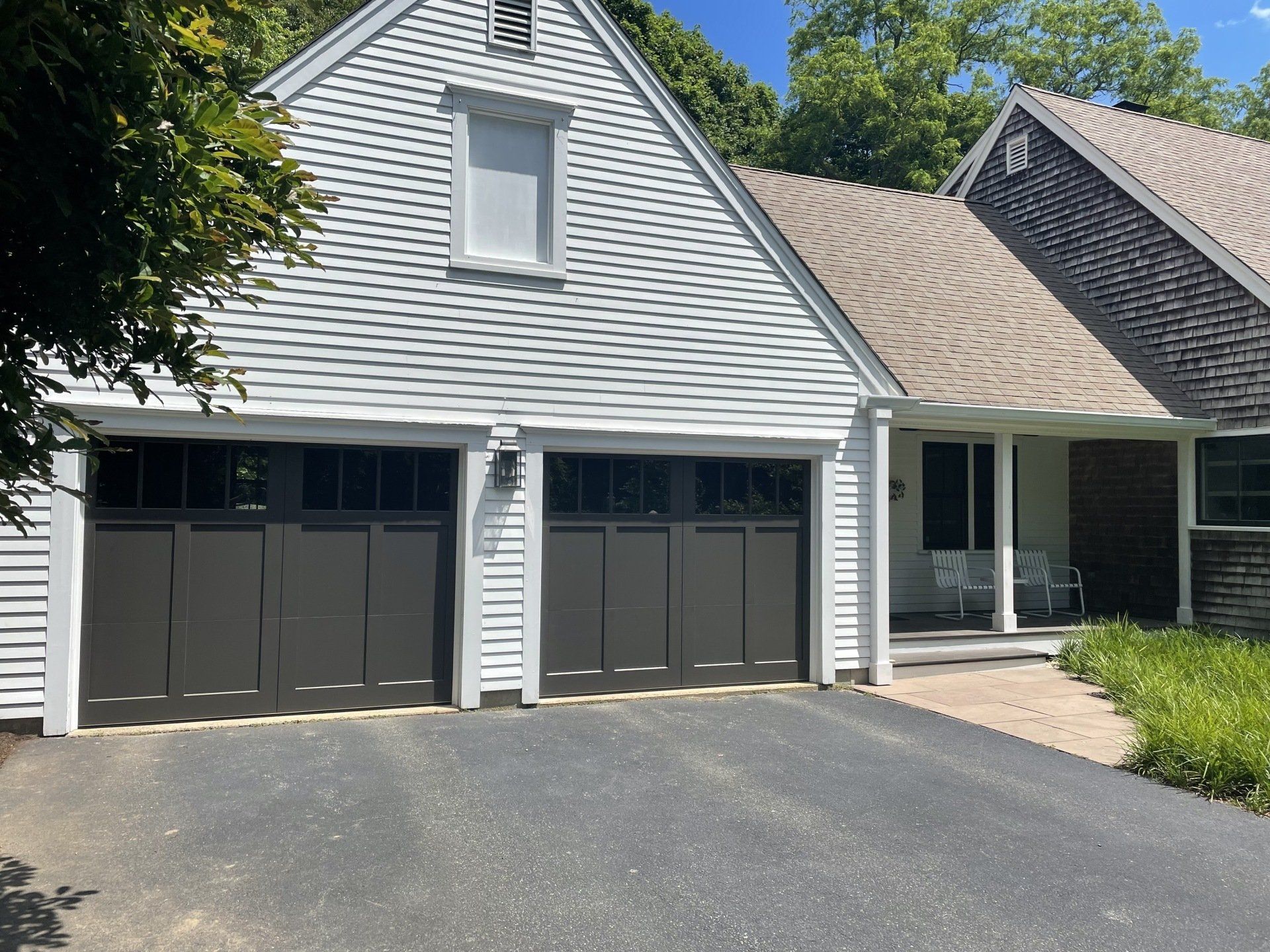 wood composite overlay black double doors side view