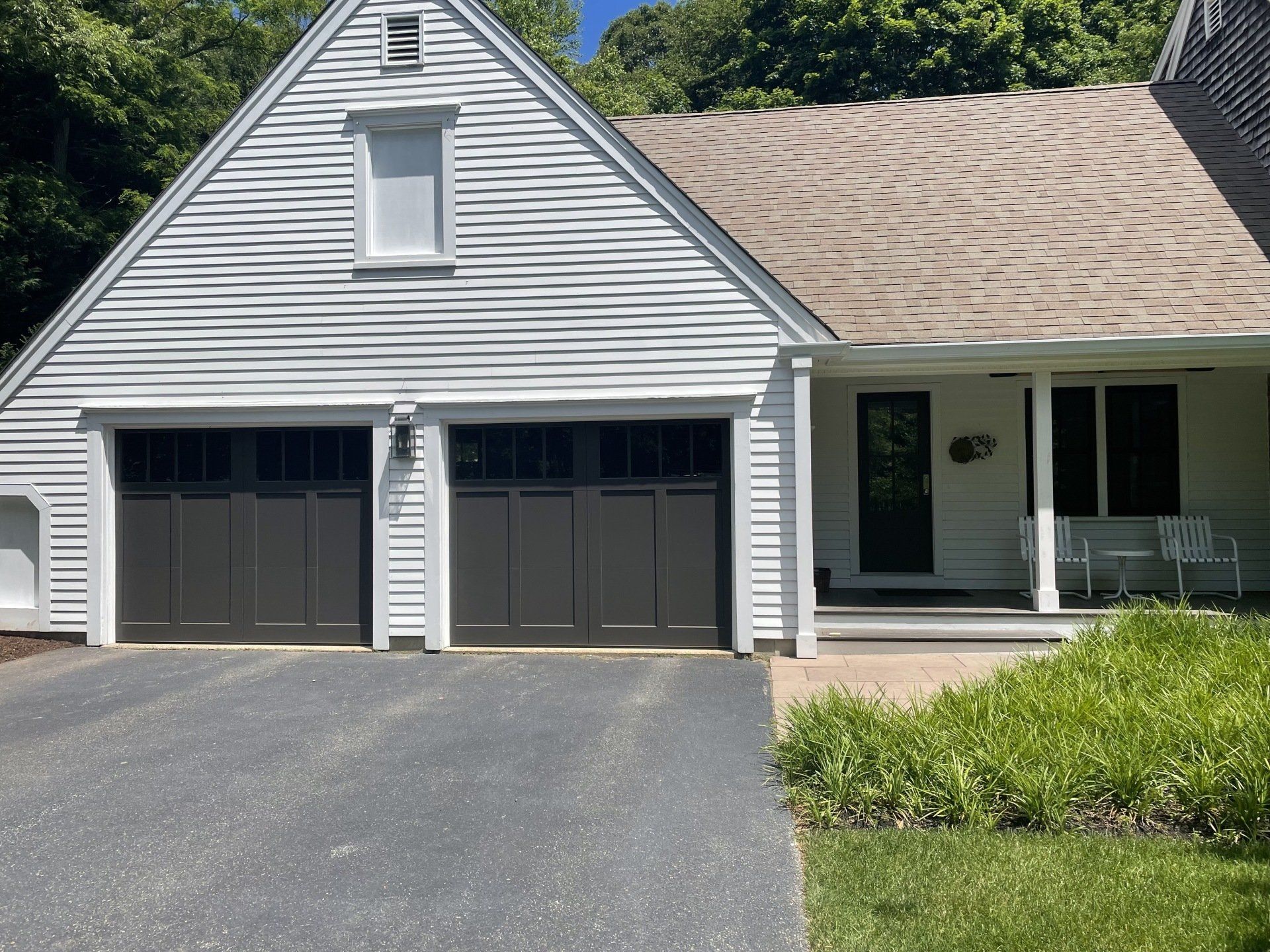 wood composite overlay black double doors full house view