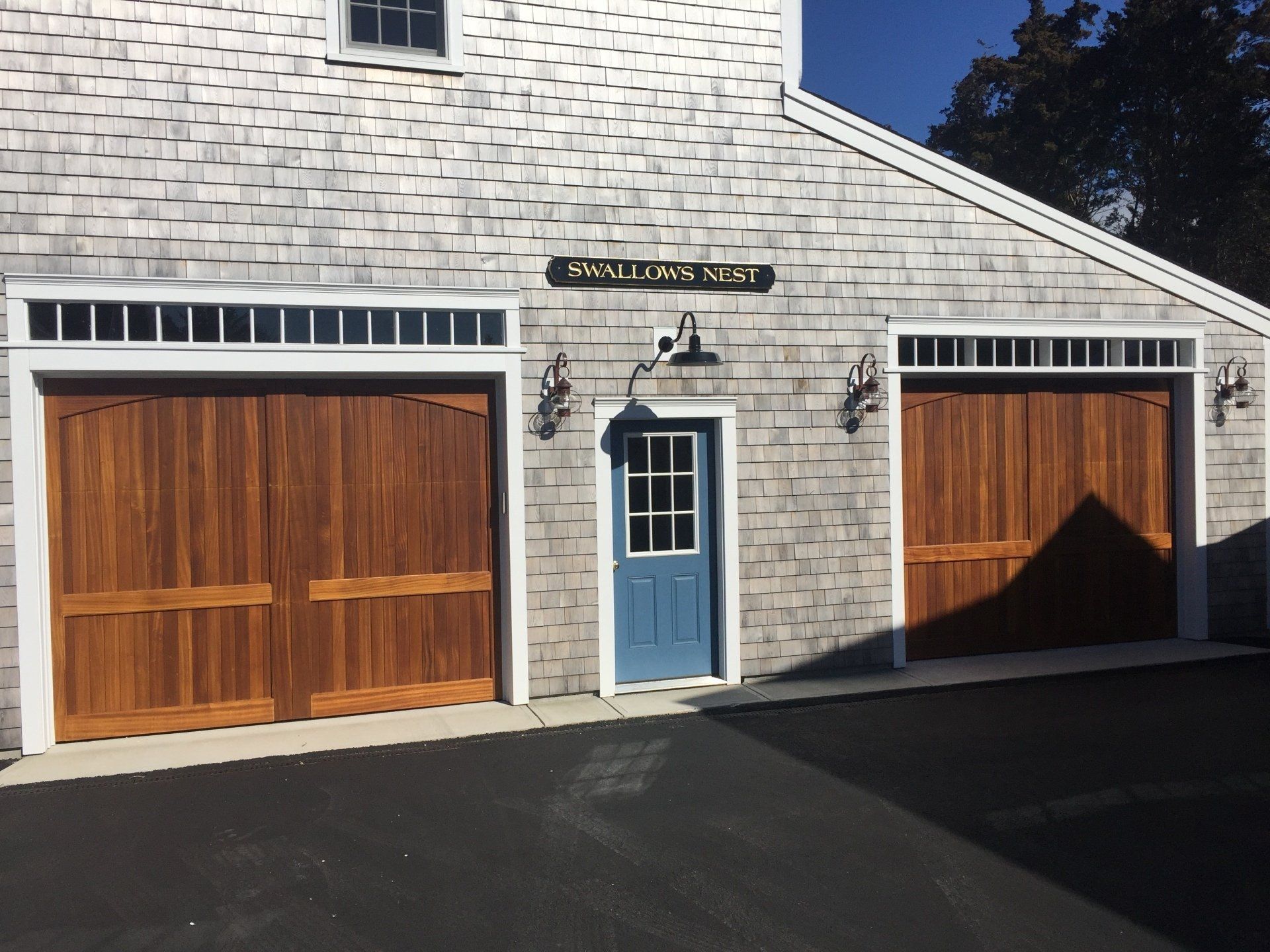 double door  wood overlay with blue door on the middle