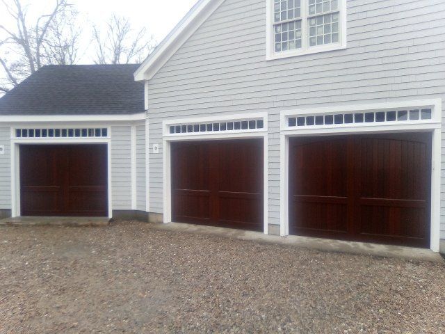 wood overlay on white house 3 doors