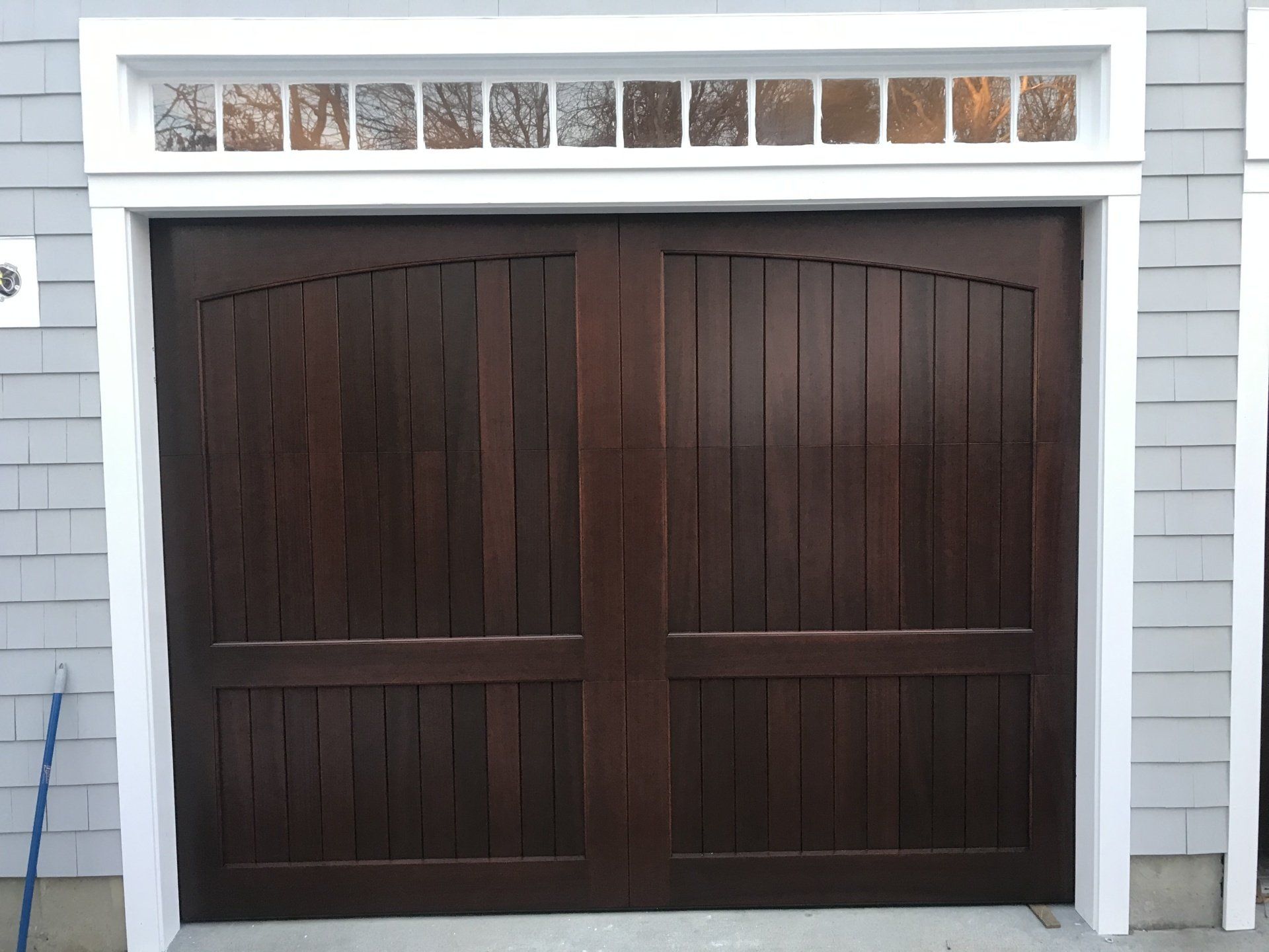 wood overlay closer look on white colored house