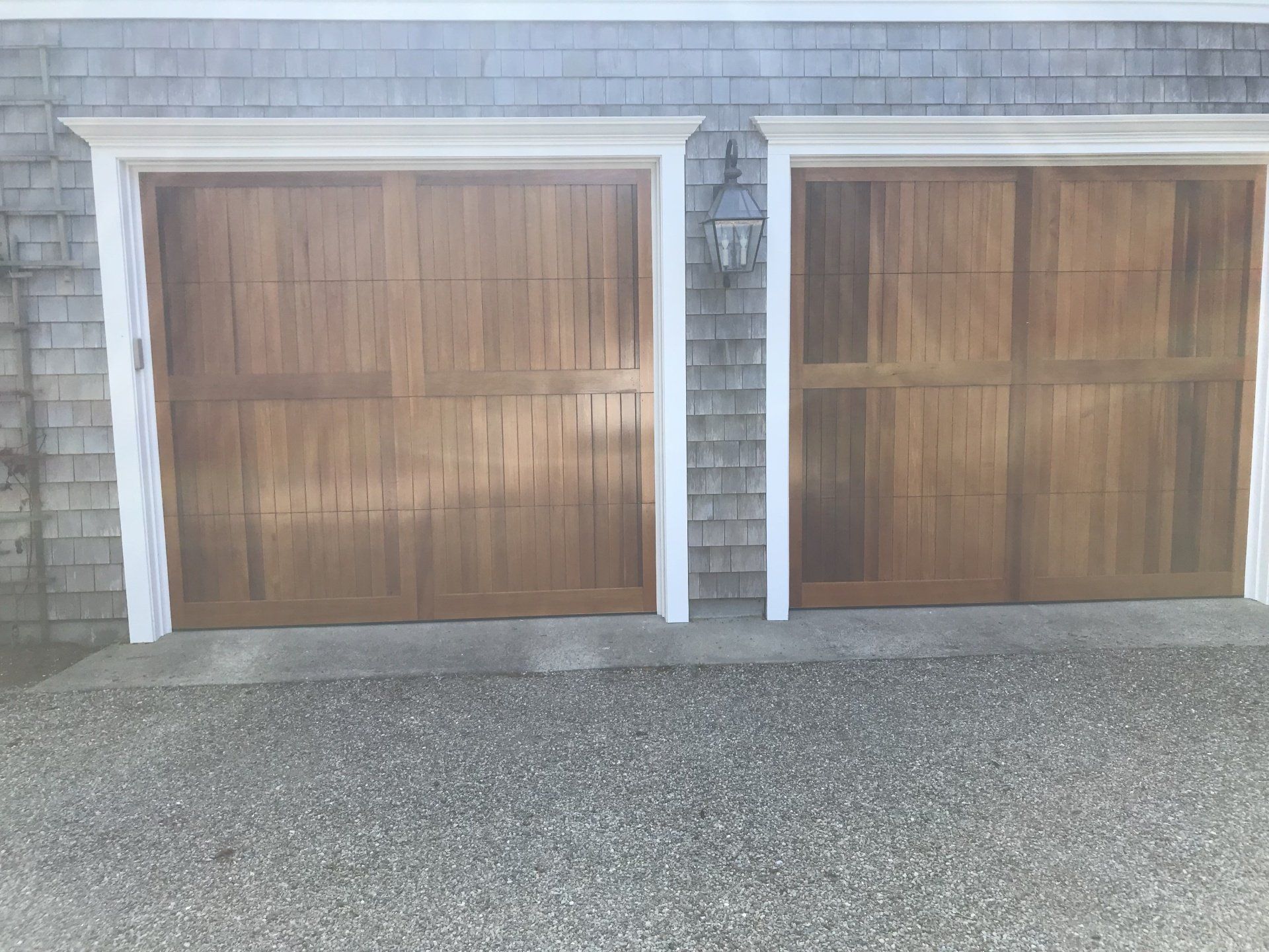 wood overlay double garage door brown