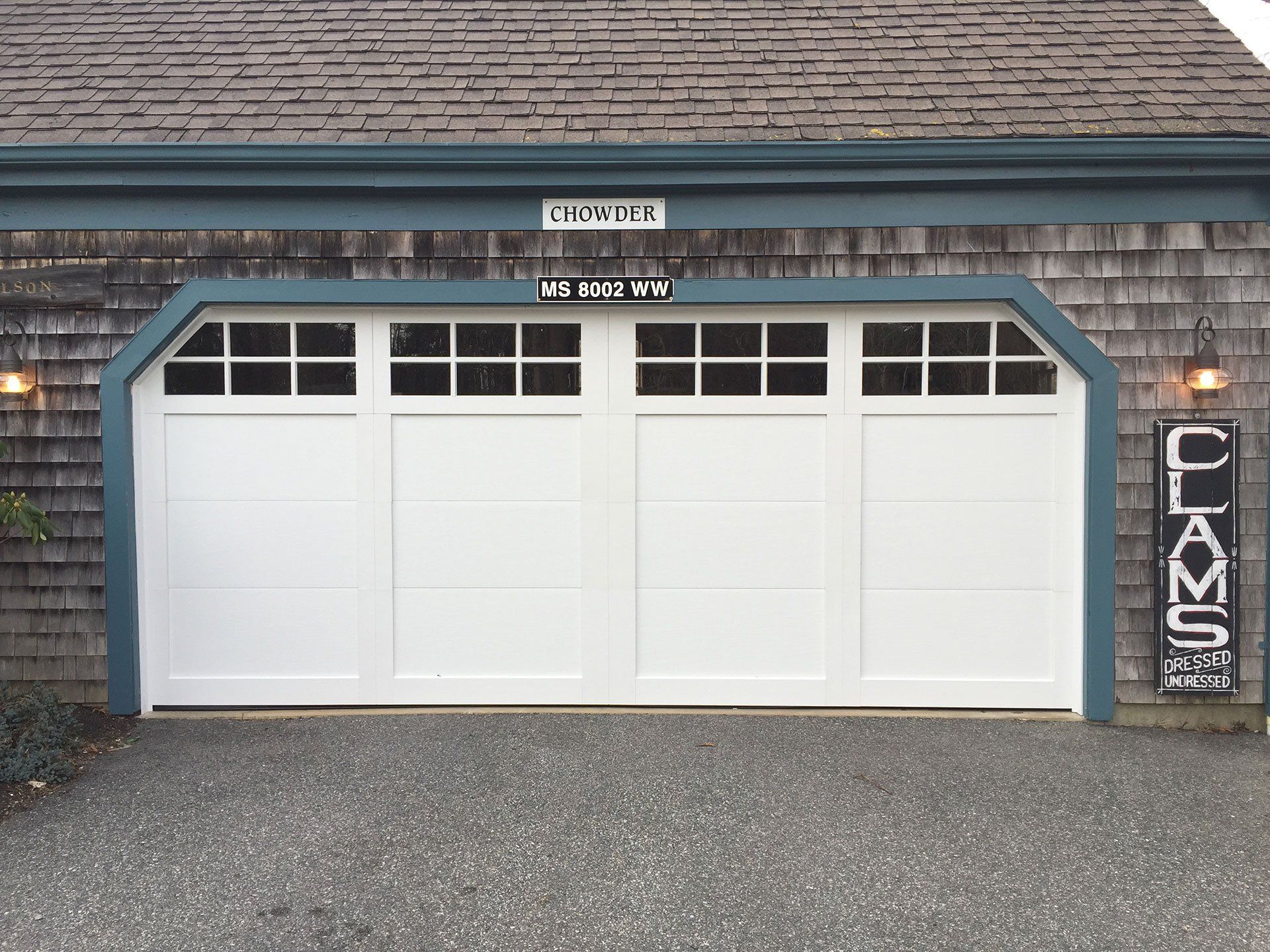 white garage door with blue frame