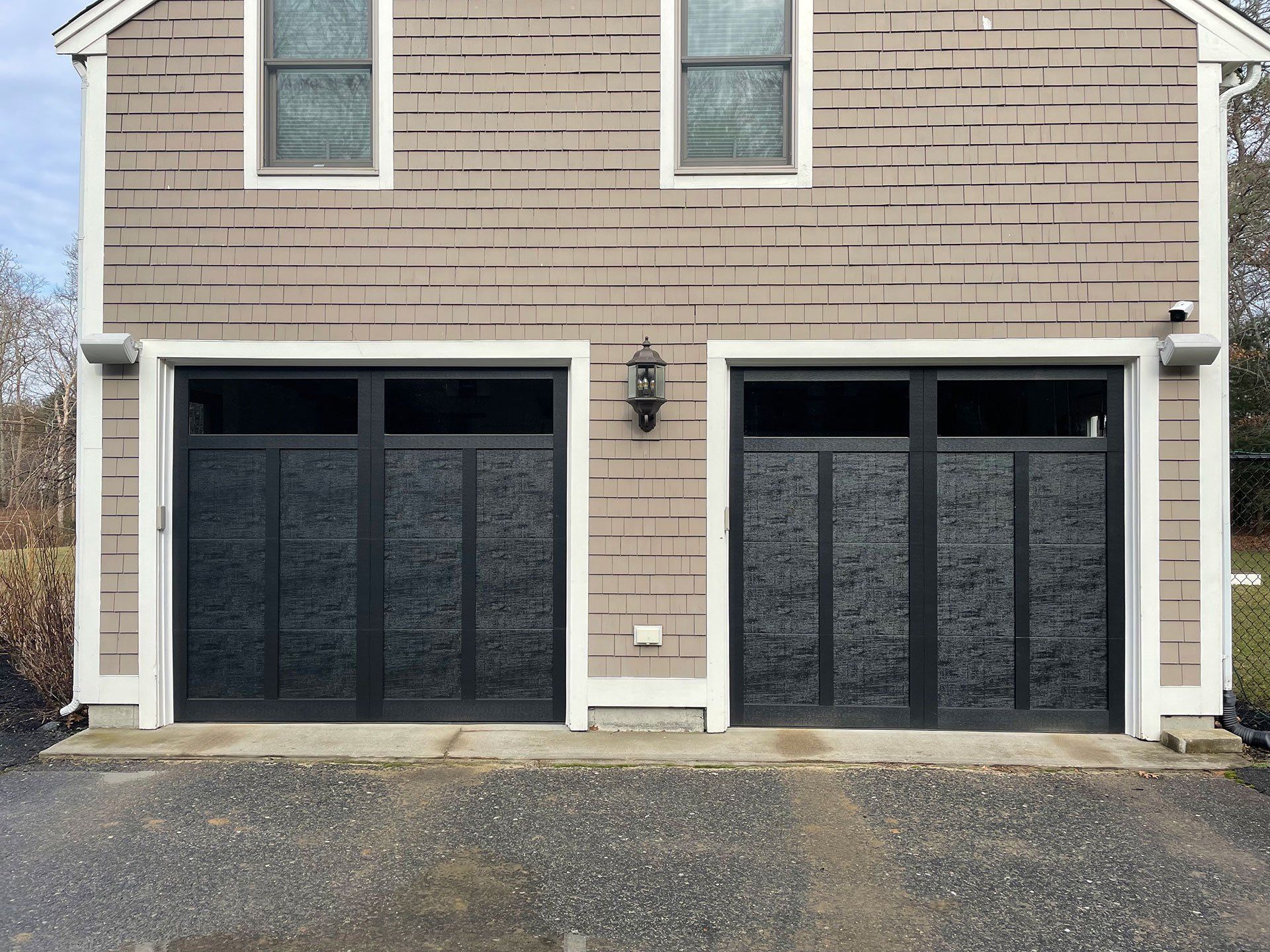 two black garage doors