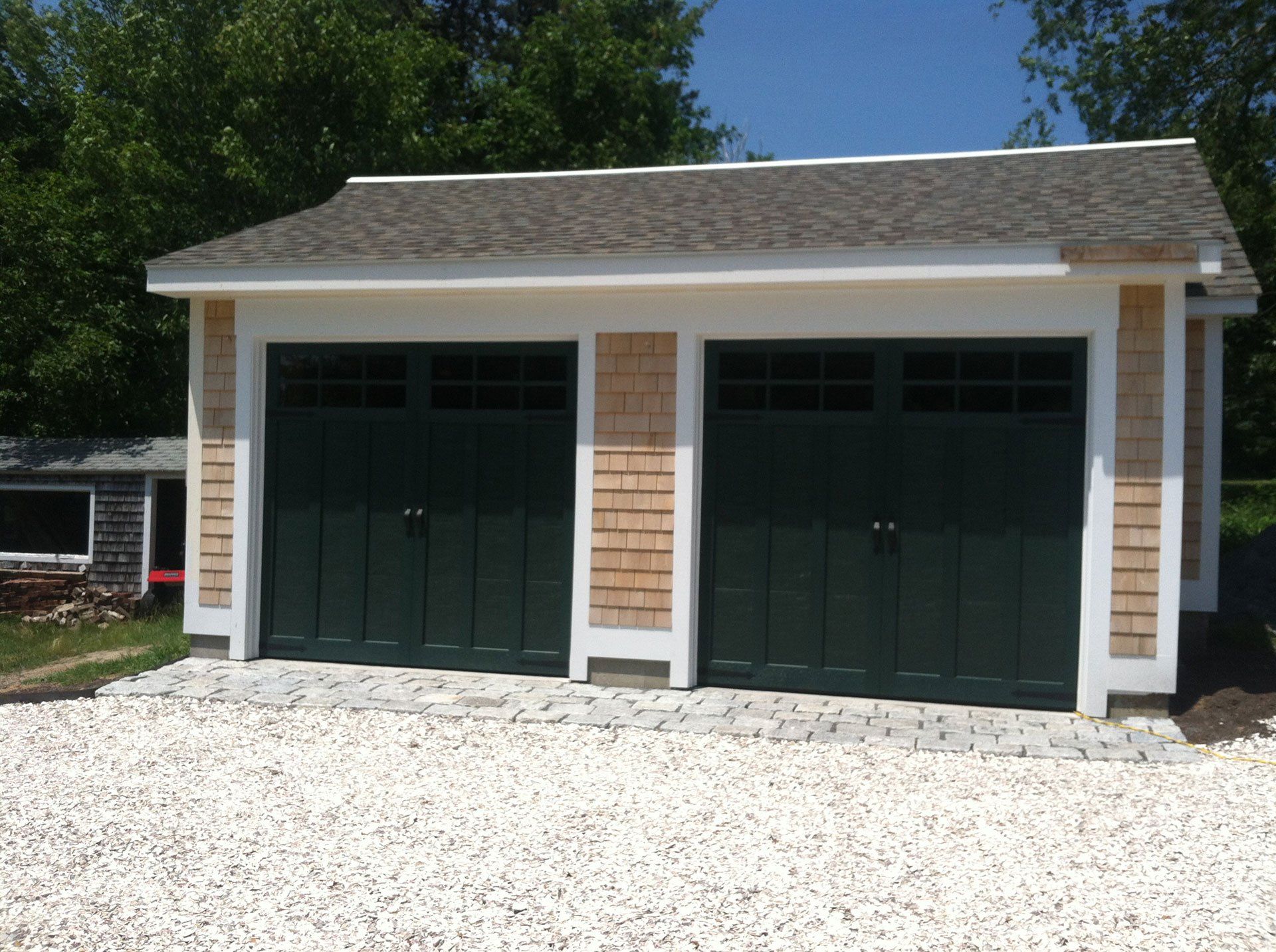 black doors of detached garage
