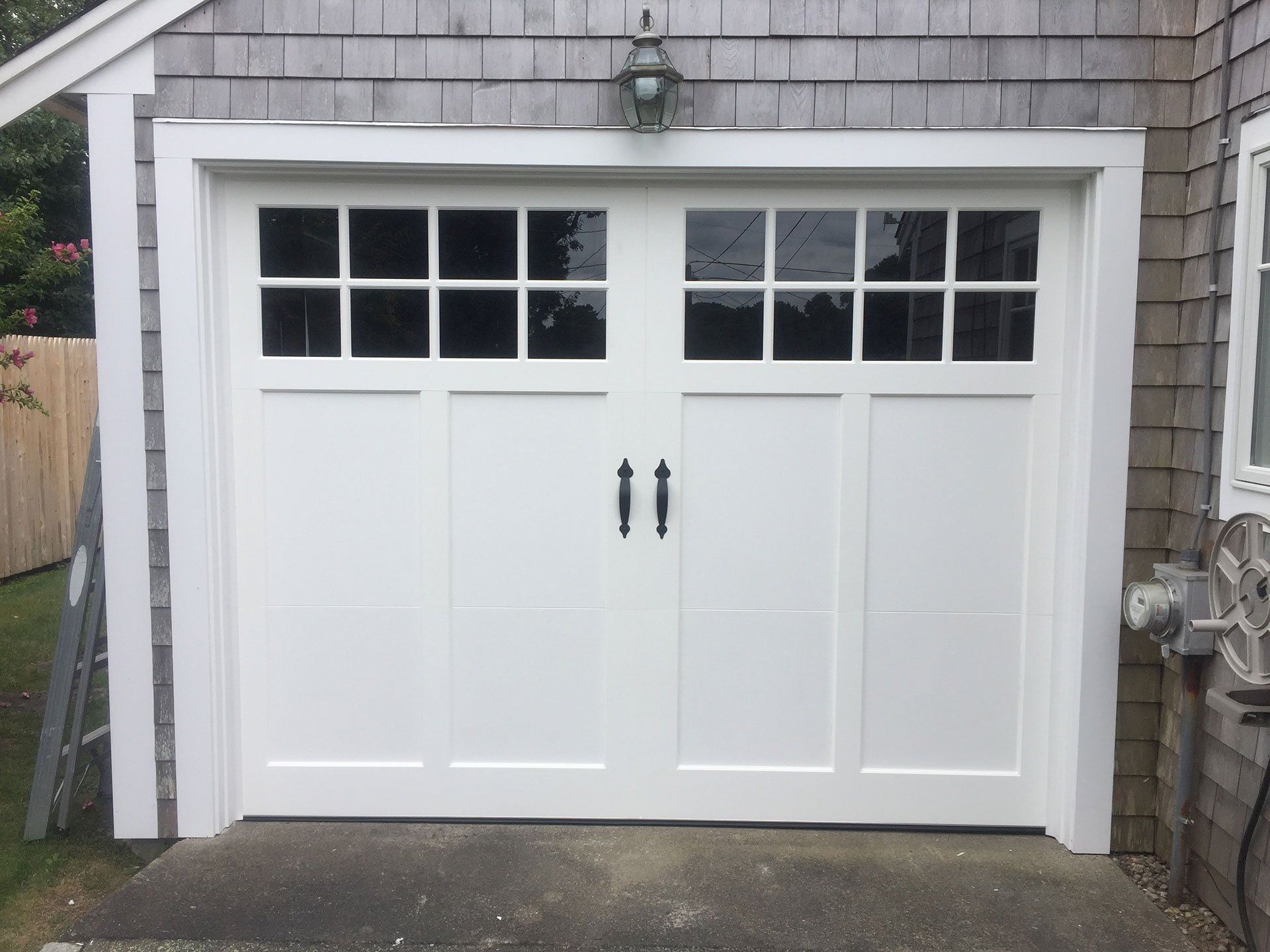 garage door with windows at the top