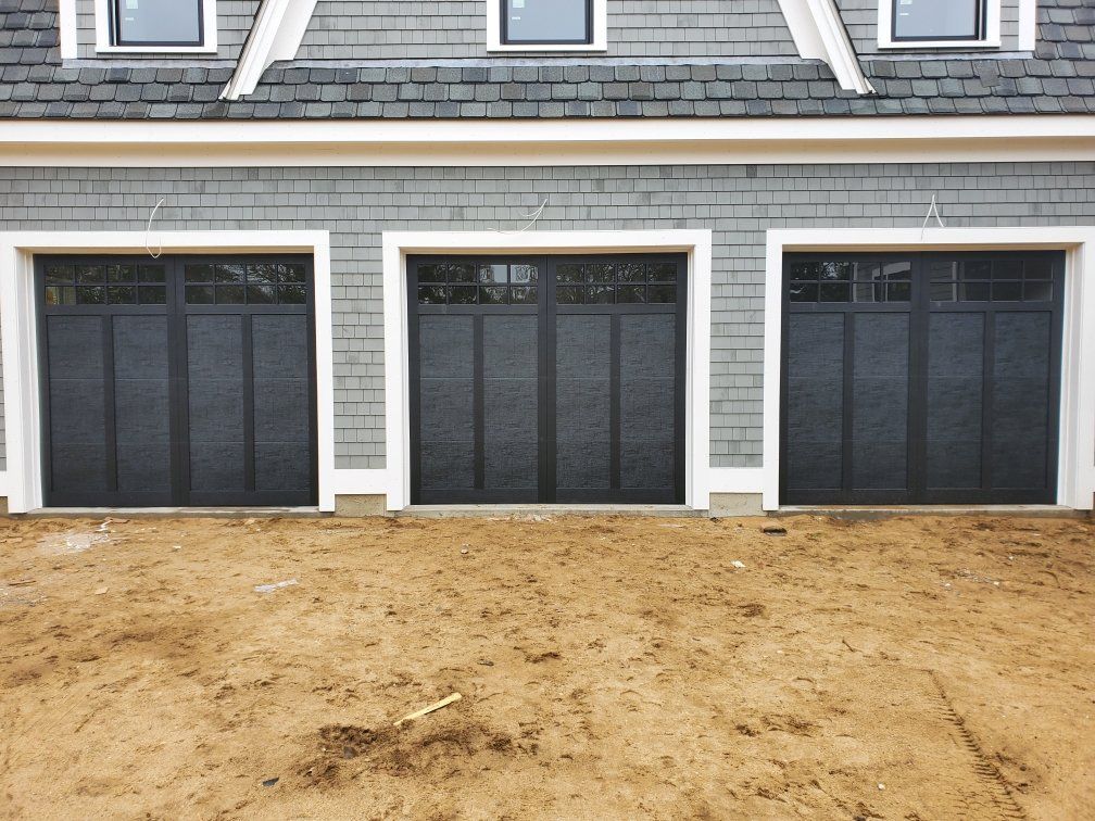 three garage doors