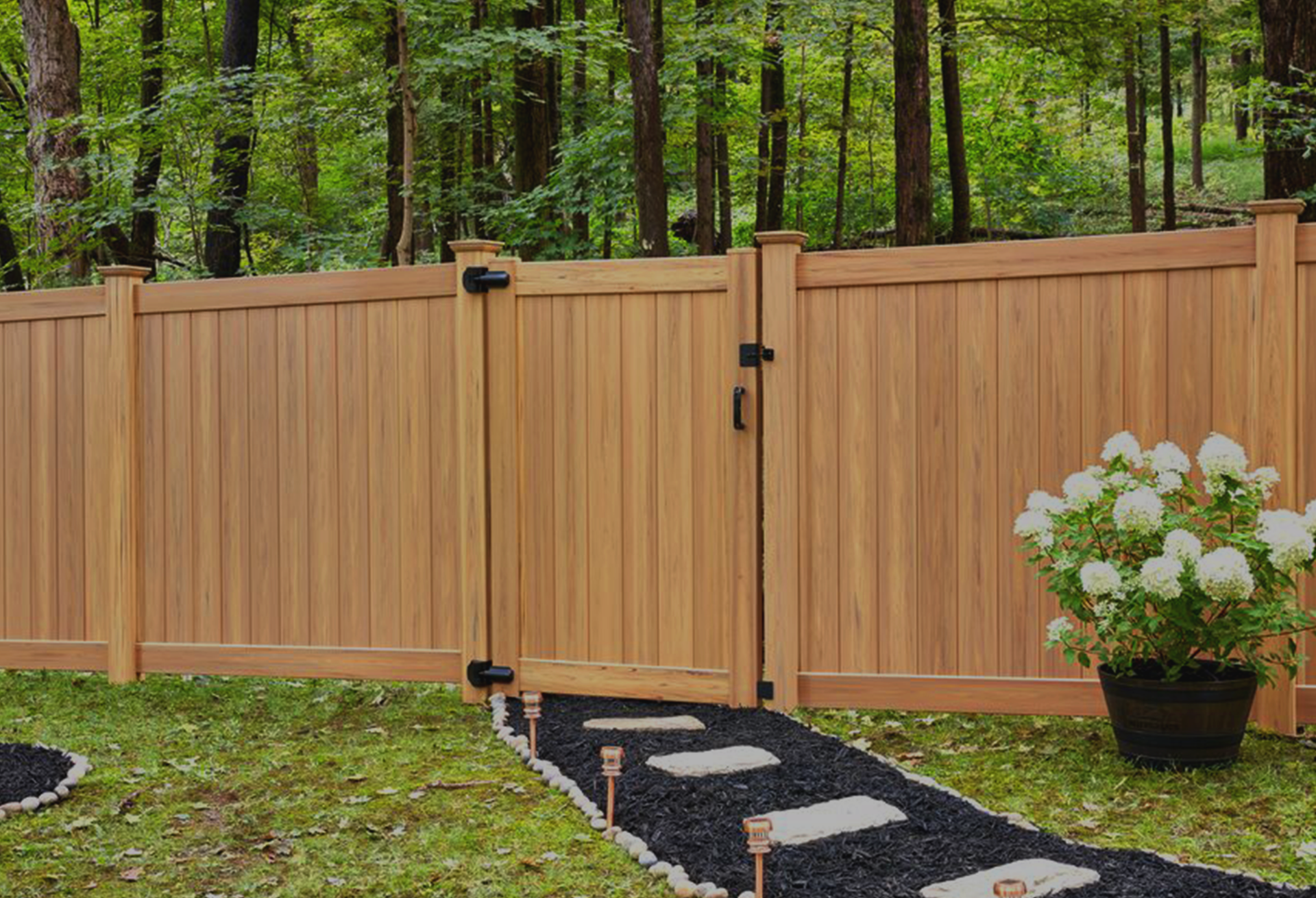 Brown fence with gate and walkway