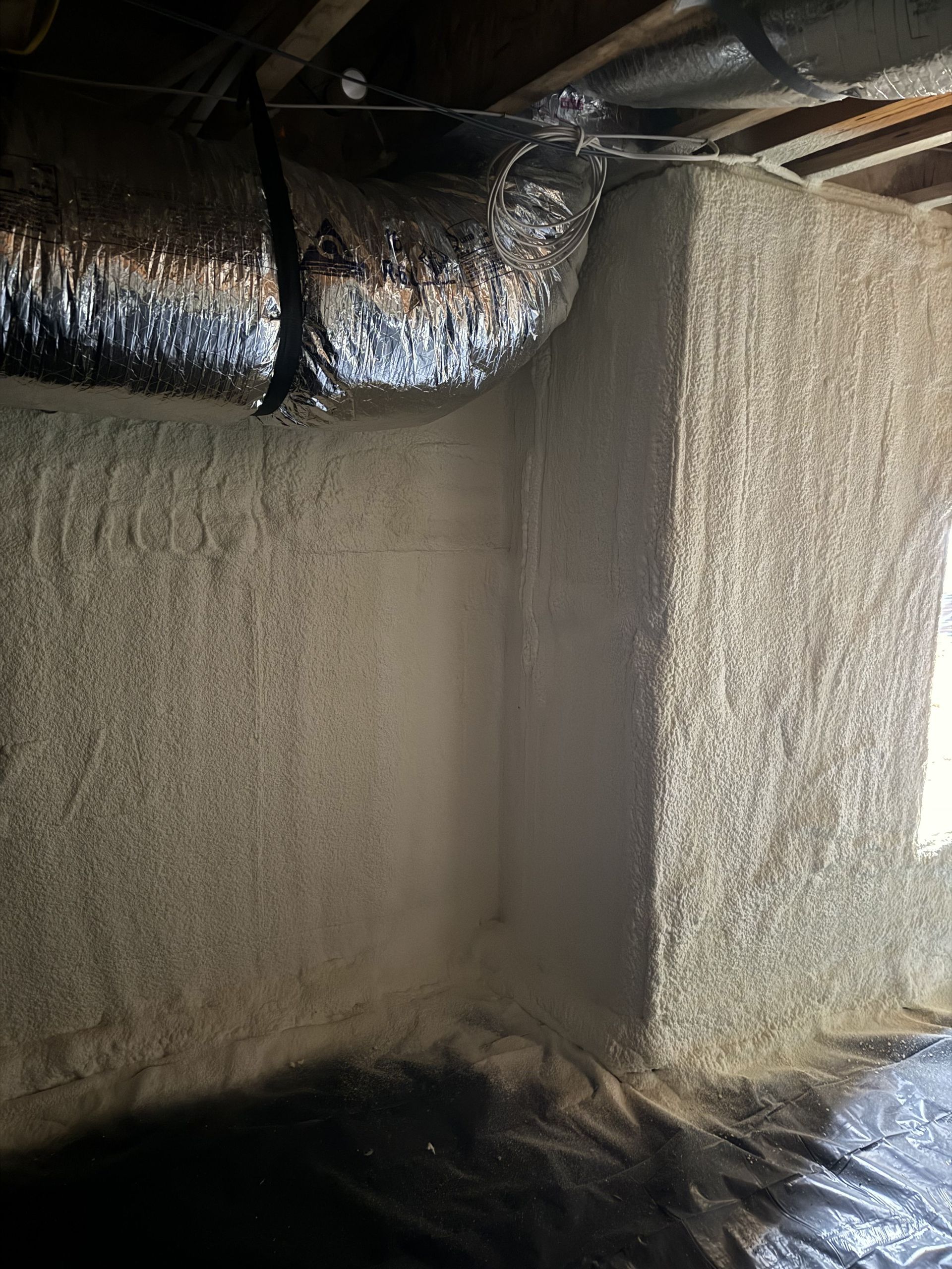 A room with a lot of insulation on the walls and ceiling.