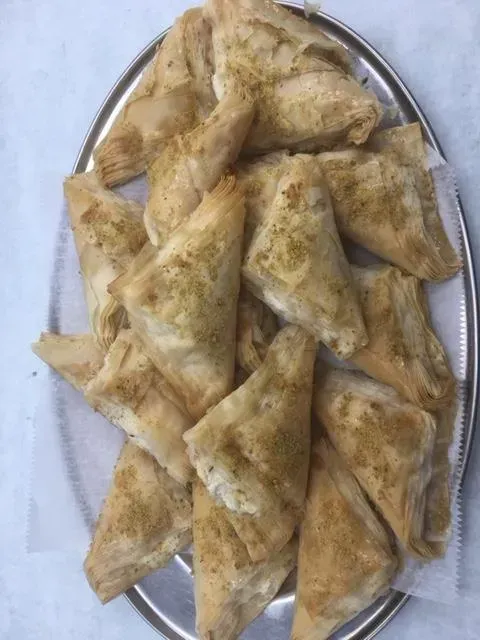 A plate of food with a lot of triangles on it.